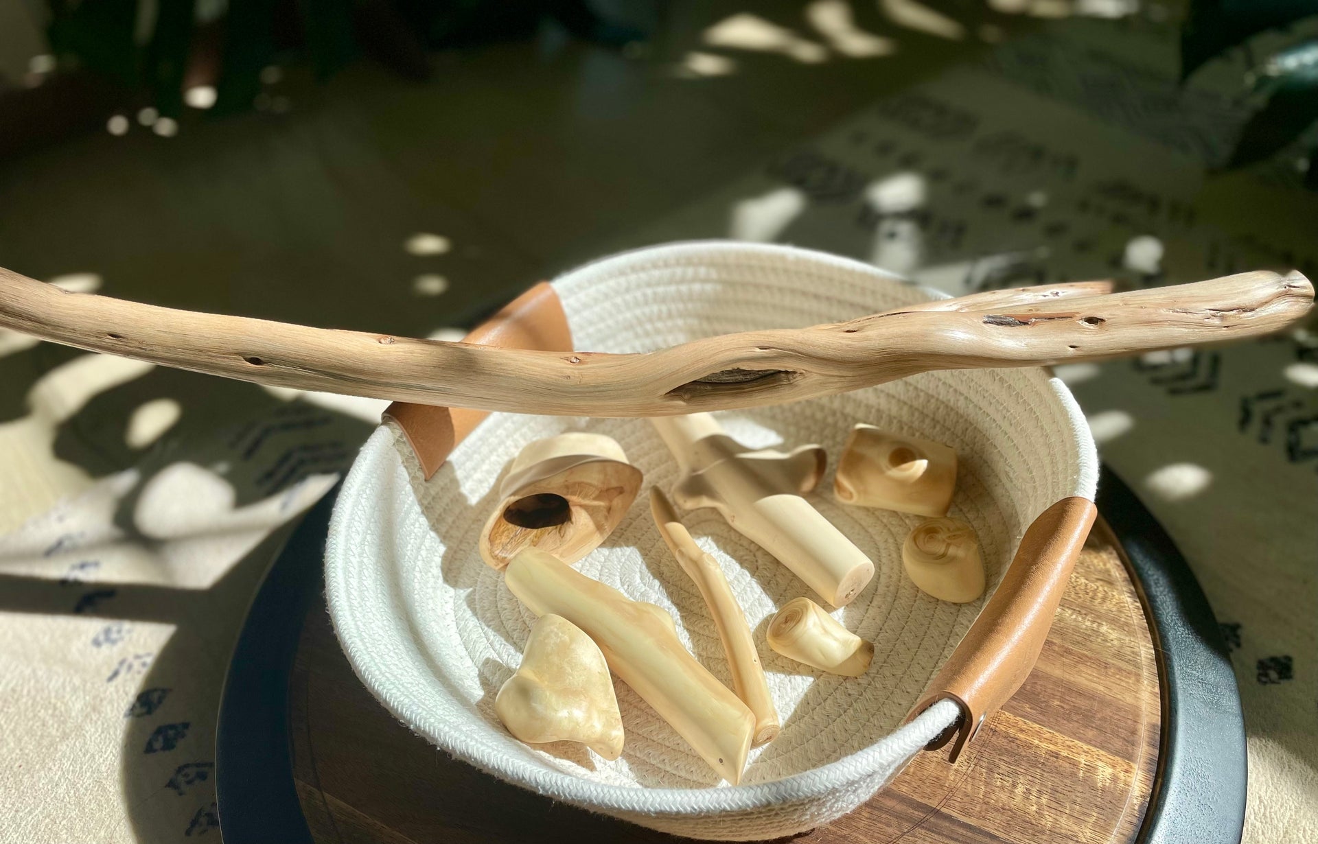 Handmade wellness goods collection — handcrafted cedar fidget sculptures and grounding pieces