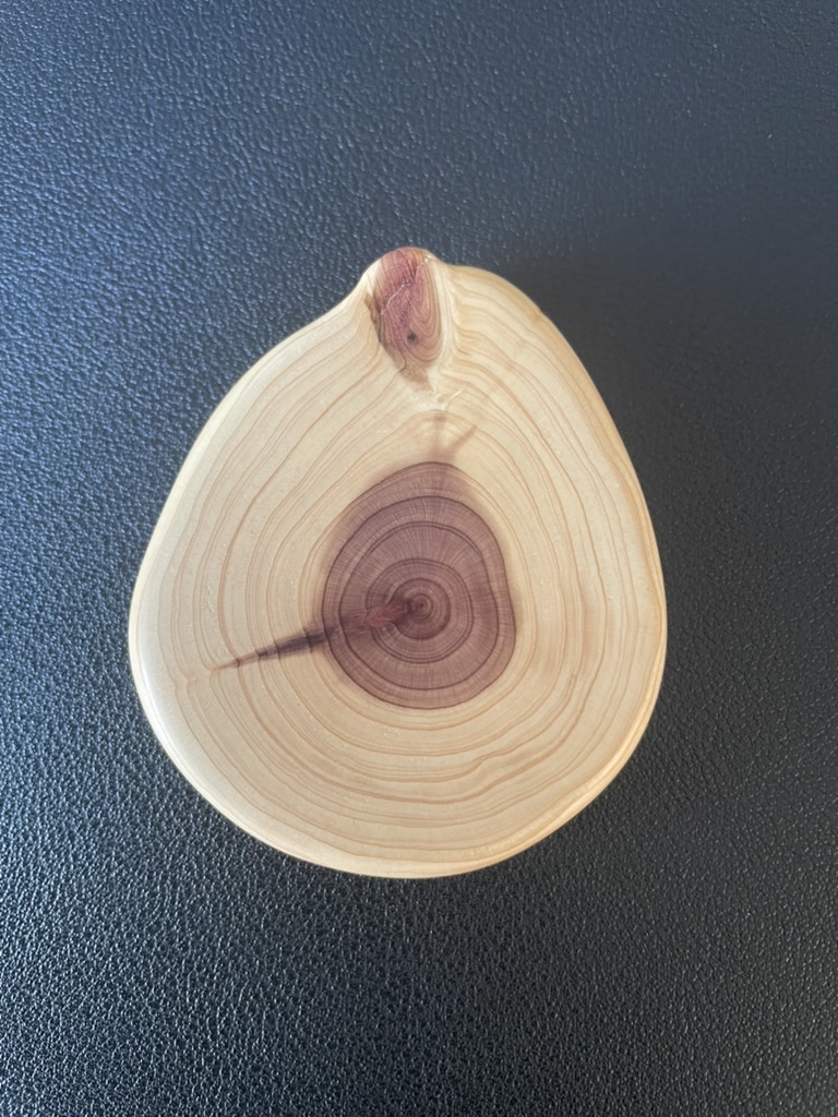Twin Core cedar wood fidget with double-sided grain patterns